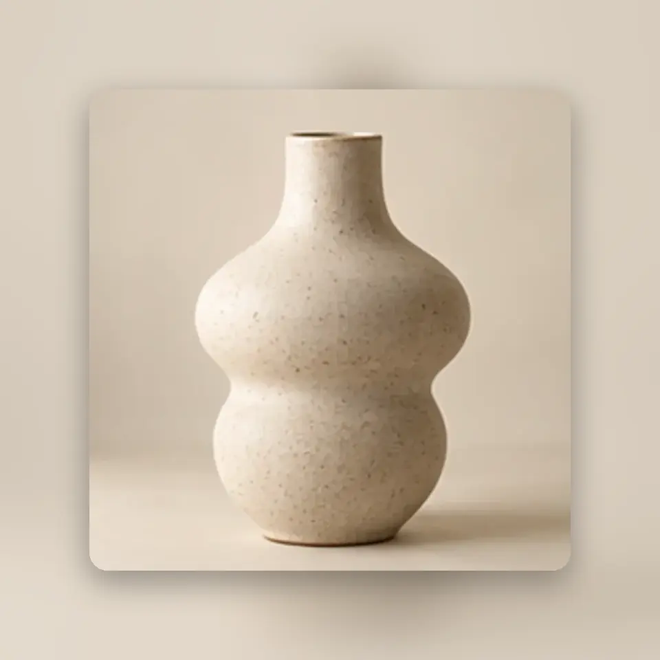 Sculpted Ceramic Vase — styled product view